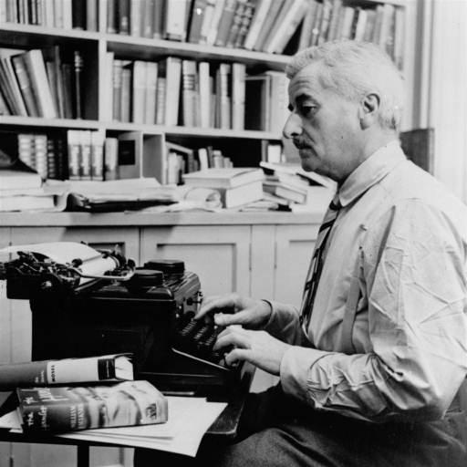 Wm Faulkner at his desk